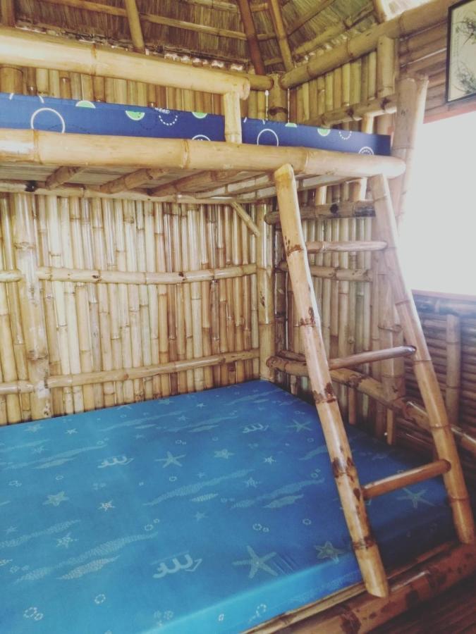 Hostel Titanic'S Nipa Hut Moalboal Zewnętrze zdjęcie